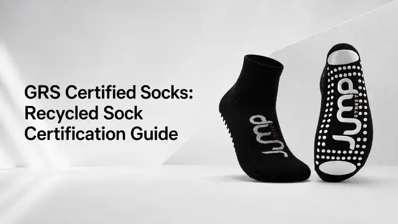 Close-up of GRS certified recycled socks with eco-friendly branding and dotted design, highlighting sustainable sock certification.