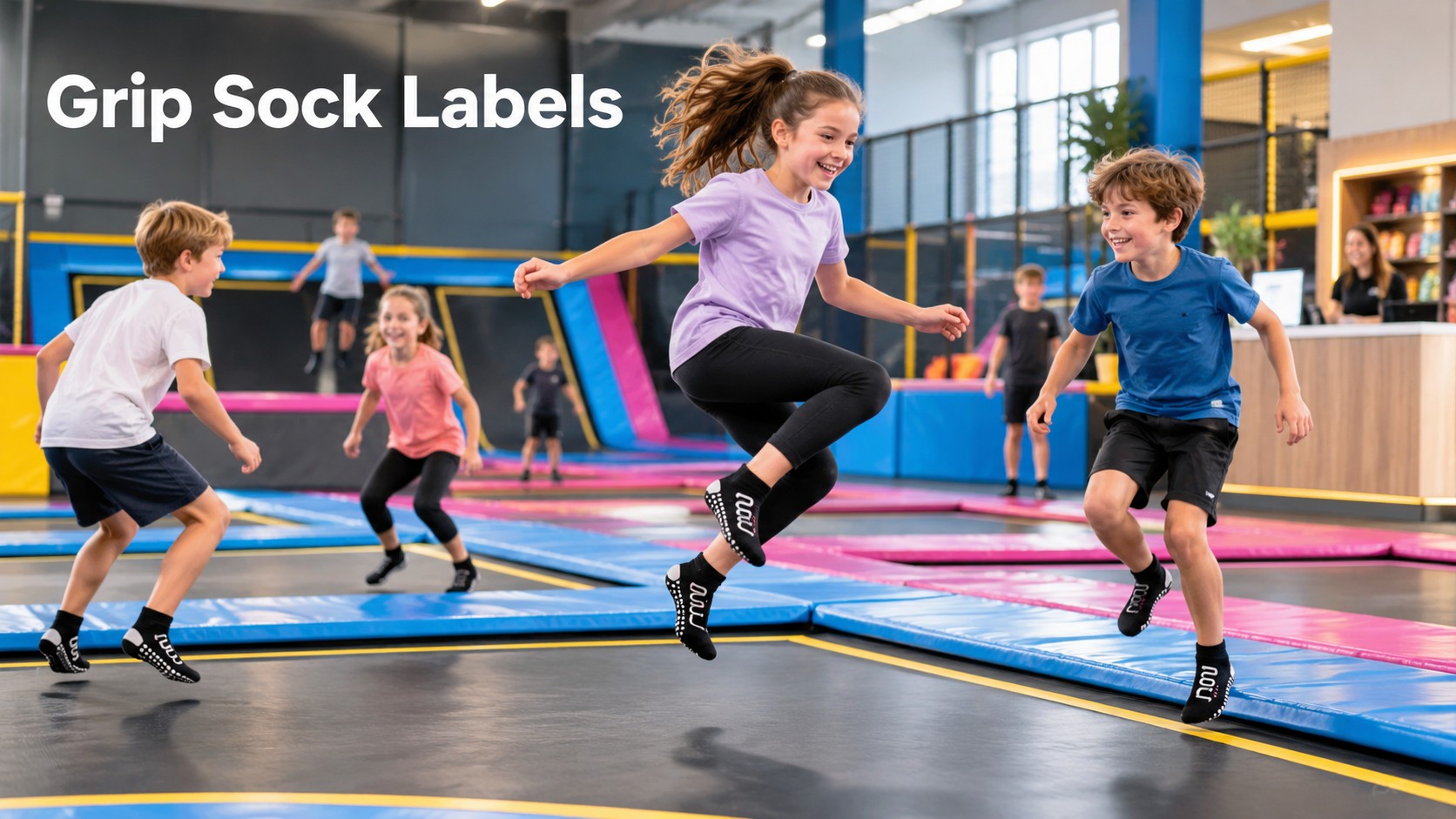Children wearing labeled grip socks at a trampoline park