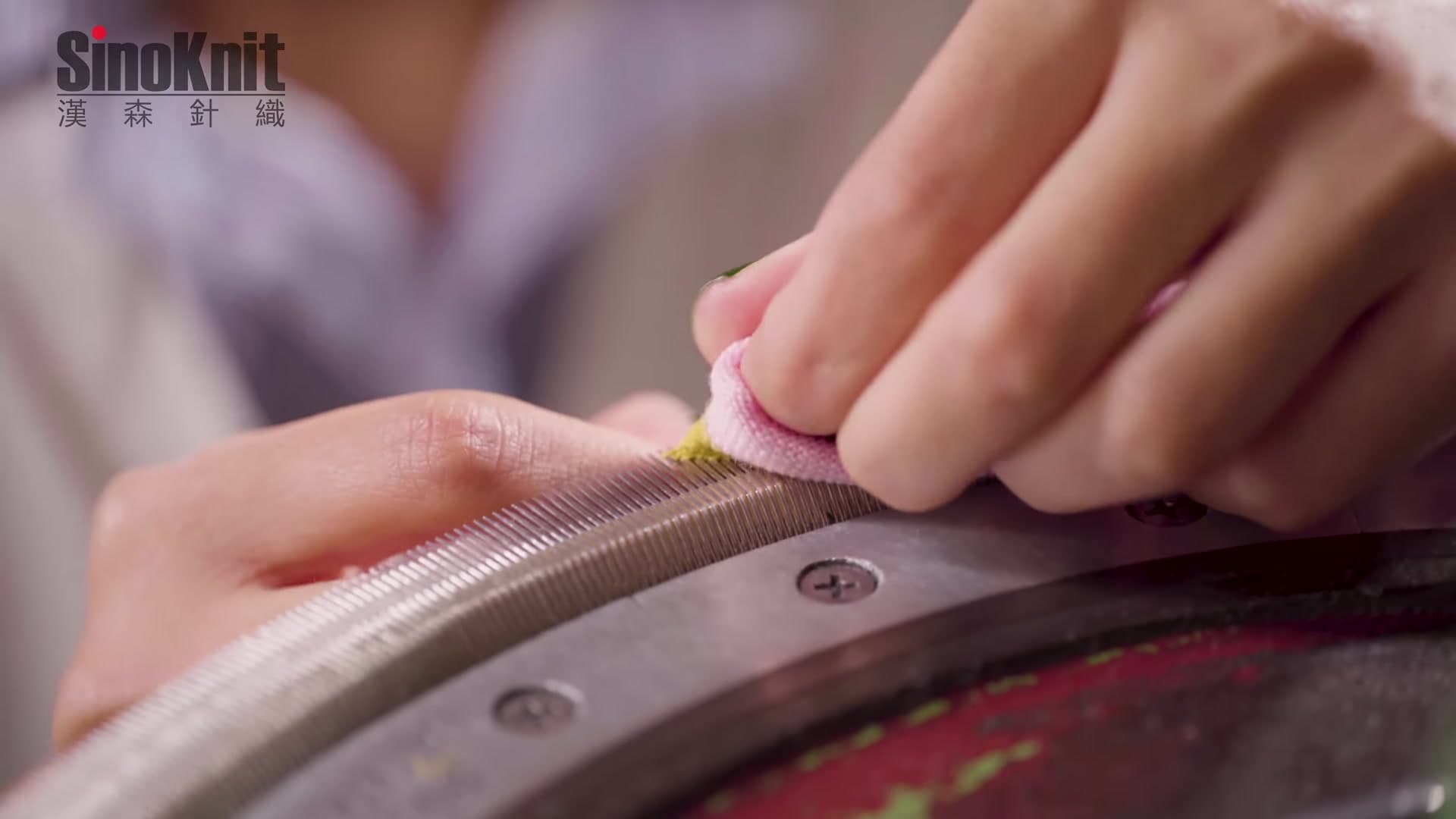 Hand linking sock toes on a linking machine